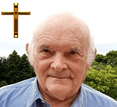 Photo G Bigot avec une croix
